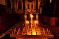 Prayer candles lit in remembrance of deceased loved ones in Tartu Uspenski Cathedral (Orthodox).