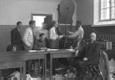 Defense League members surrender their arms at the gym of the Tallinn unit of the Defense League on the foot of Toompea Hill. The receiving center was located on the courtyard side of the headquarters. Photo likely from June 18-19, 1940.