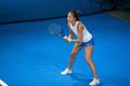 Kaia Kanepi and others on court at the Haabneeme ITF tennis tournament.