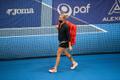 Kaia Kanepi and others on court at the Haabneeme ITF tennis tournament.