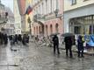 People gathering around the Russian Embassy in Tallinn on polling day.