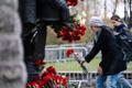 Visitors attending the Bronze Soldier monument in Tallinn on the morning of May 9, 2024.