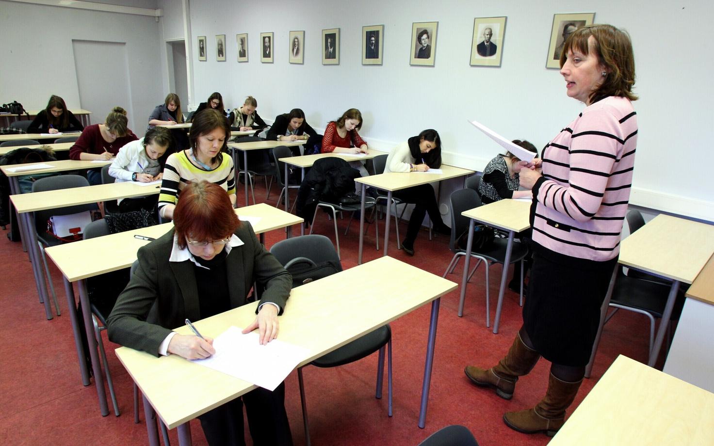 Professor Reili Argus reading the text of a dictation test on Native Language Day at Tallinn University. March 14, 2013.