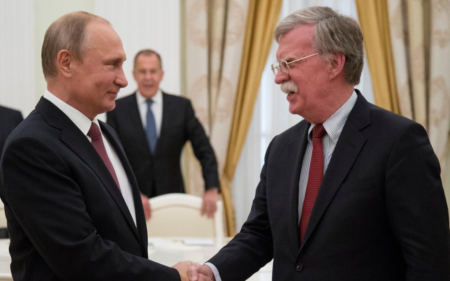 Владимир Путин и Джон Болтон.