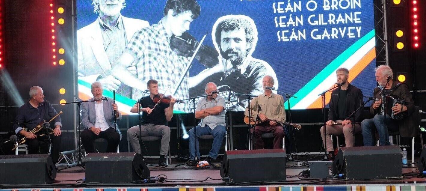 Irish musicians performing at the Tallinn Song Festival Grounds on Sunday. From left (click to enlarge): Néillidh Ó Maolagáin, Tom Ó Maolagáin, Fiachra Ó Maolagáin, Seán Gilrane, Seán Garvey, Séan Ó Broin, Breanndán Ó Beaglaoich.