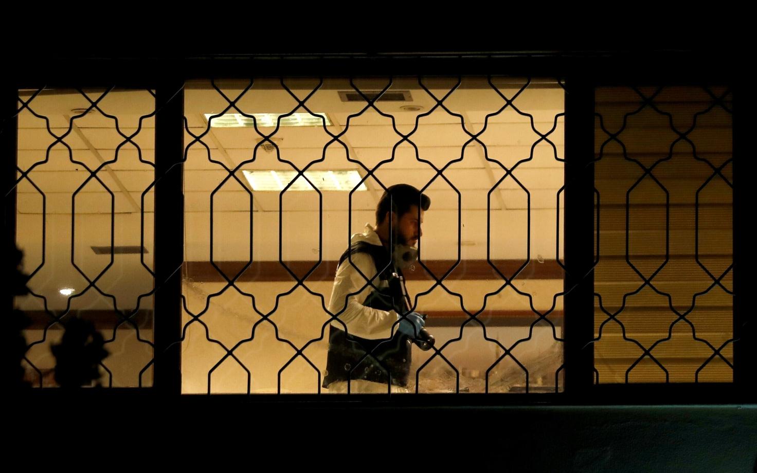 A Turkish investigator searching the offices of the Saudi Consulate in Istanbul.