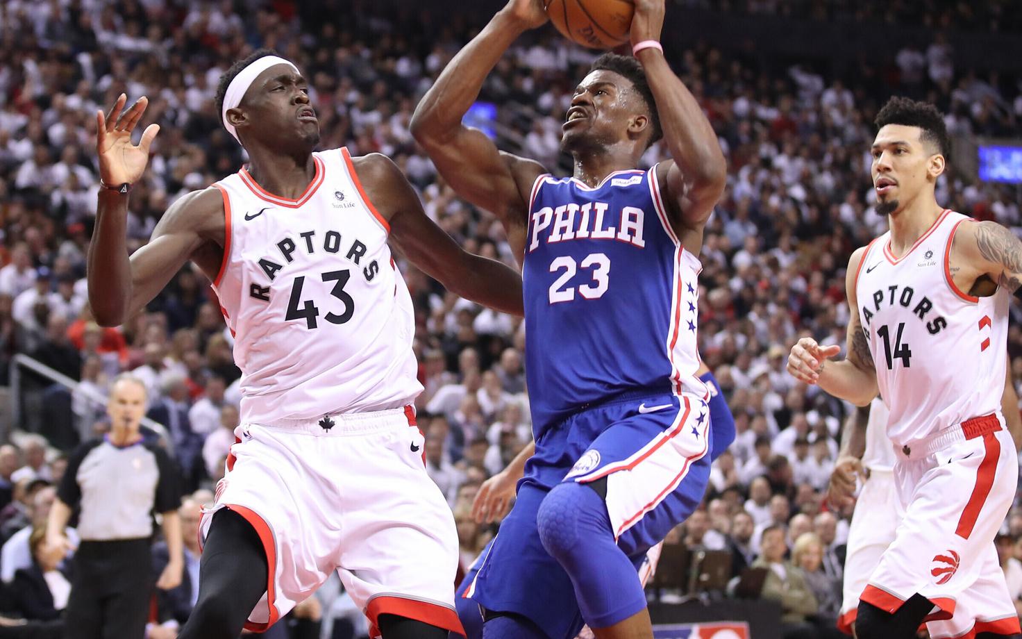 Pascal Siakam (43) ja Jimmy Butler (23)