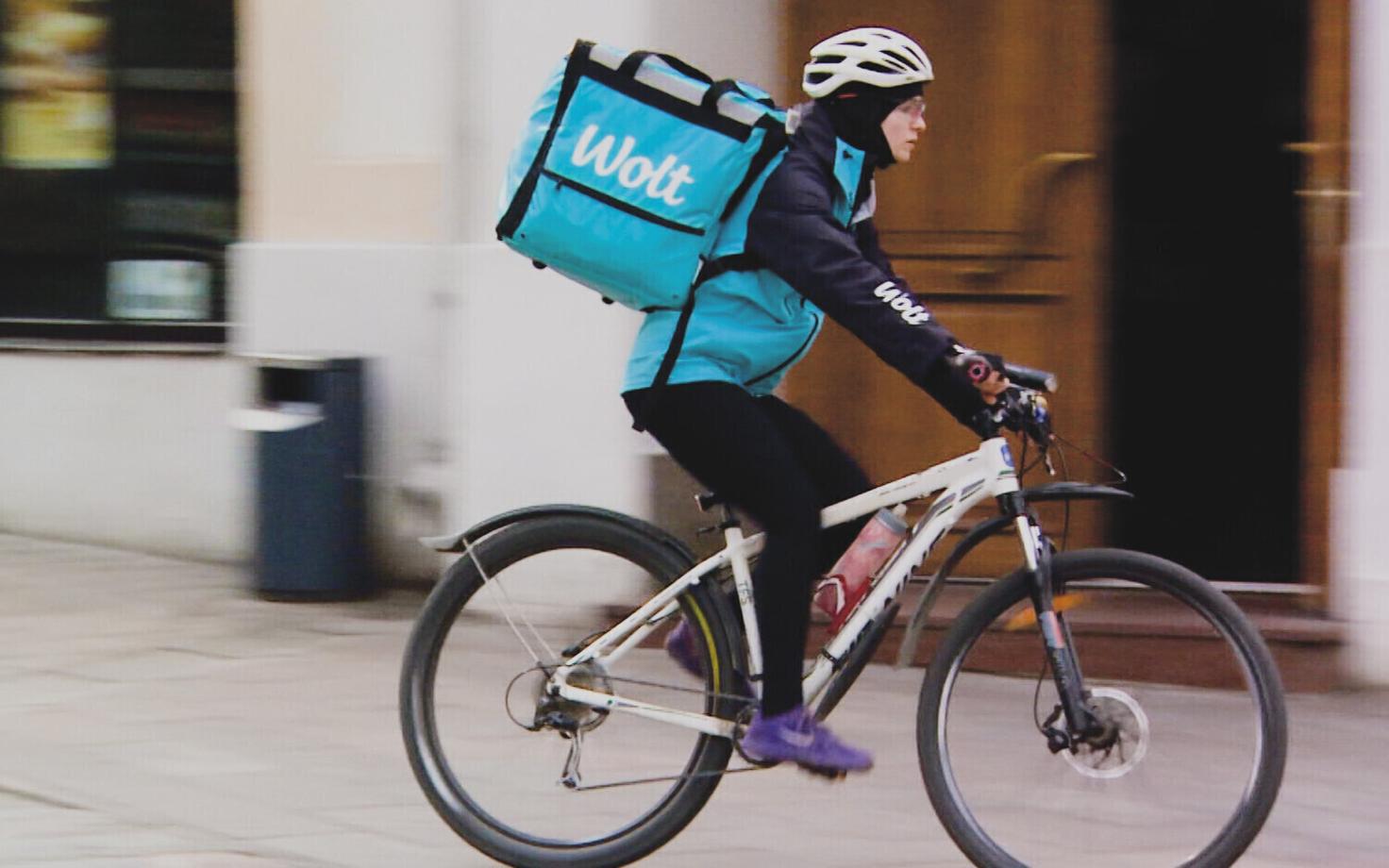 A Wolt food courier at work.