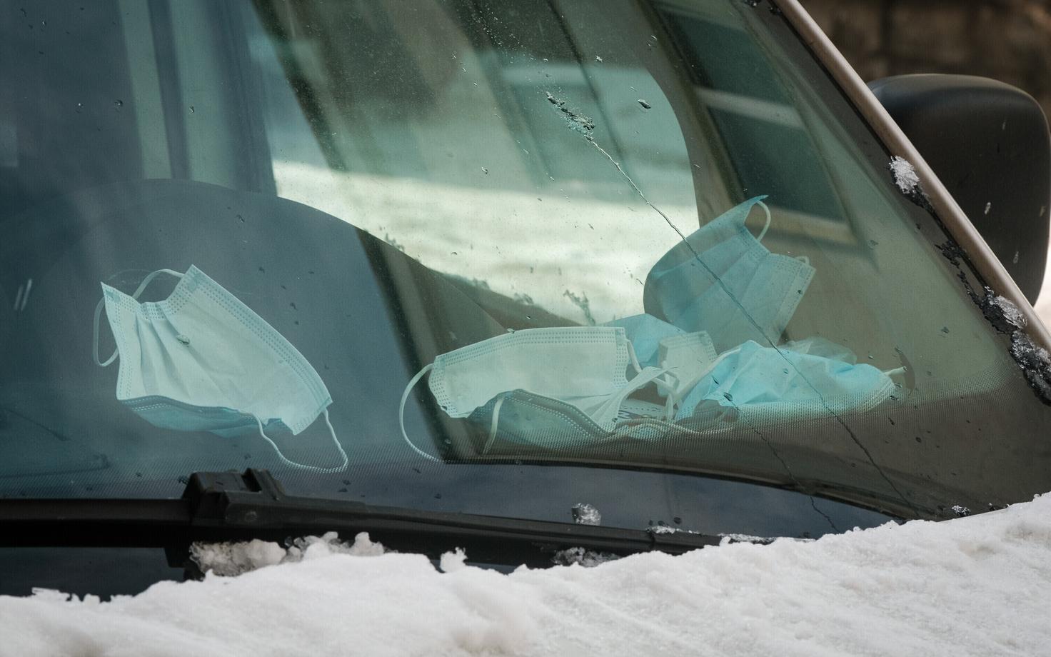 Single use masks in a car.