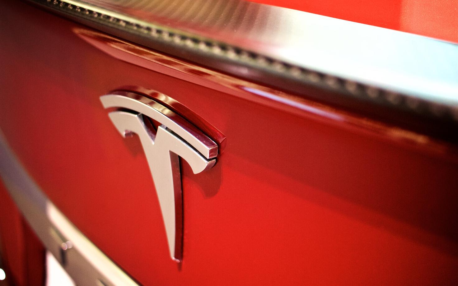 Tesla badge on one of its vehicles.