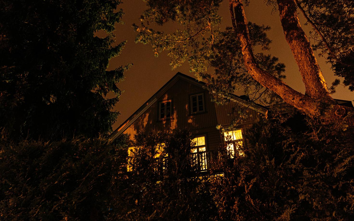 A house with lit windows.