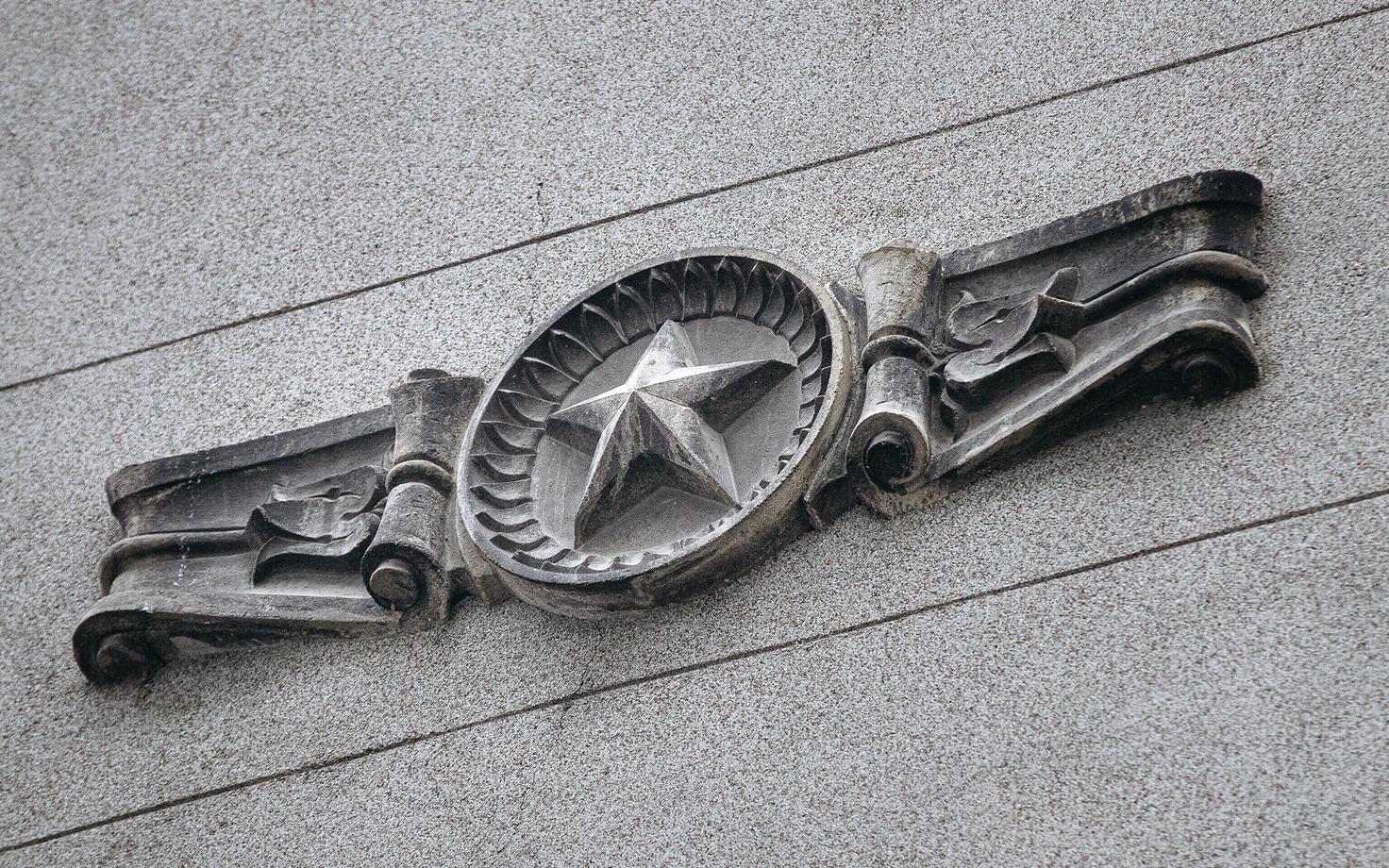 Soviet era symbol on a building in Tallinn.