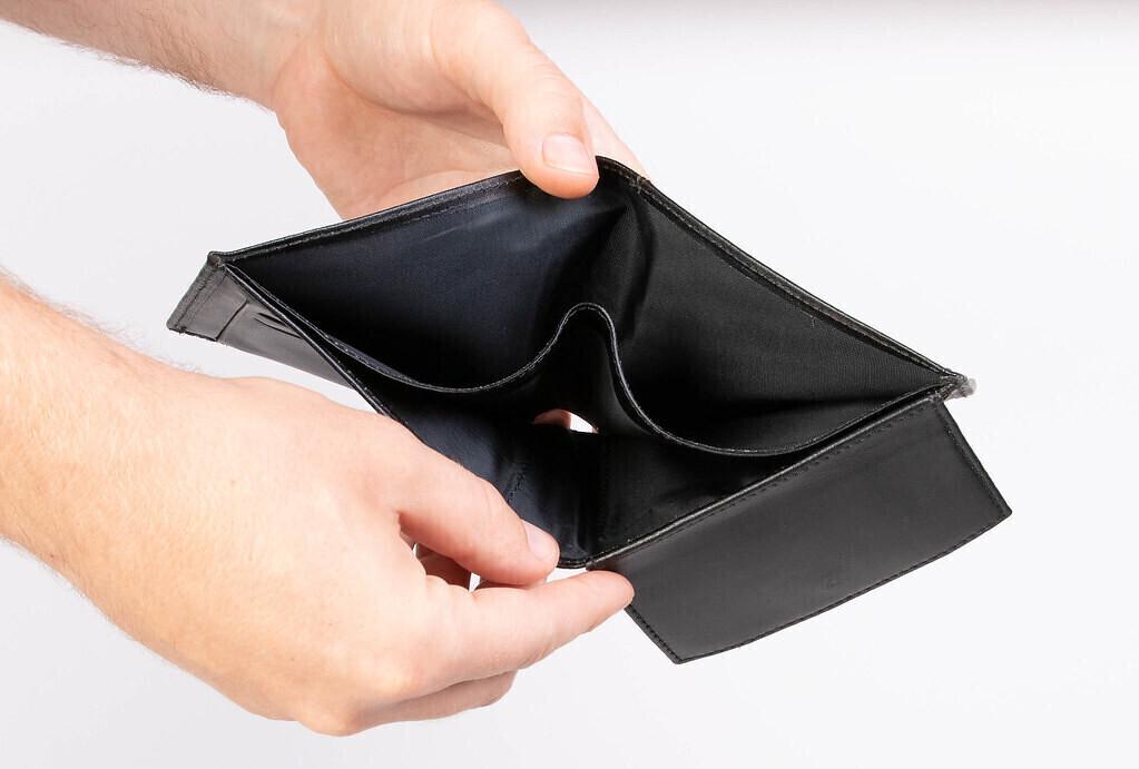 Пустой кошелек. Иллюстративная фотография.
