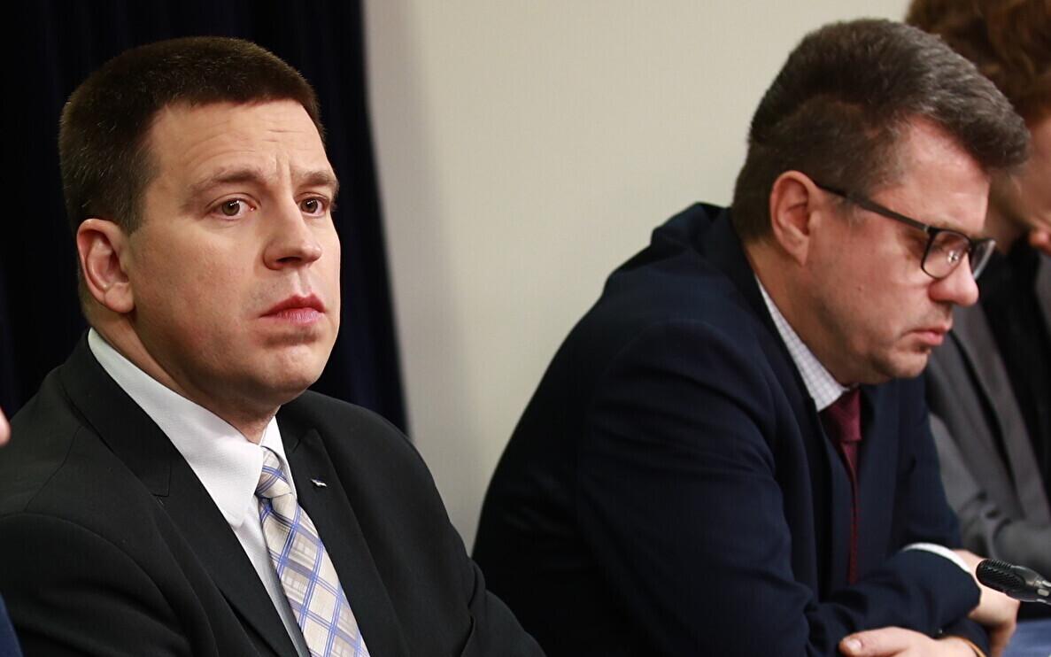 Лидер центристов Юри Ратас и председатель Isamaa Урмас Рейнсалу.