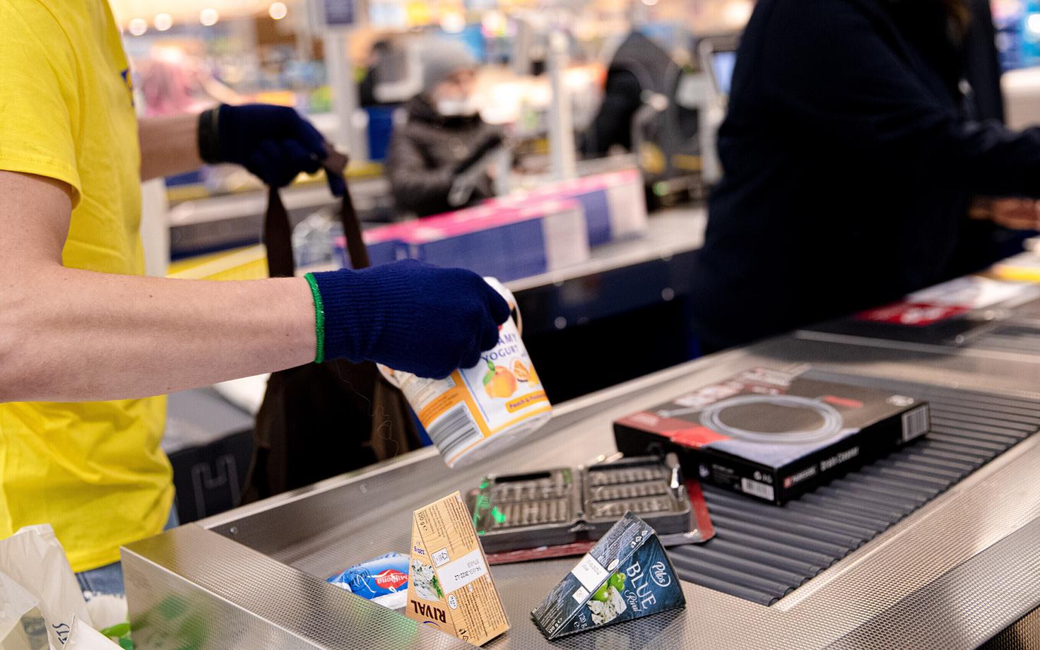 Checkout employees at a Lidl supermarket in Tallinn. March 2022.