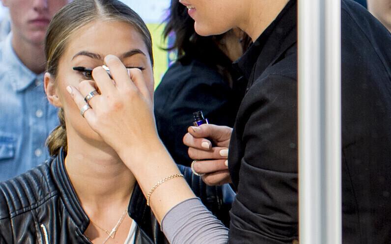 Makeup being applied (illustrative).