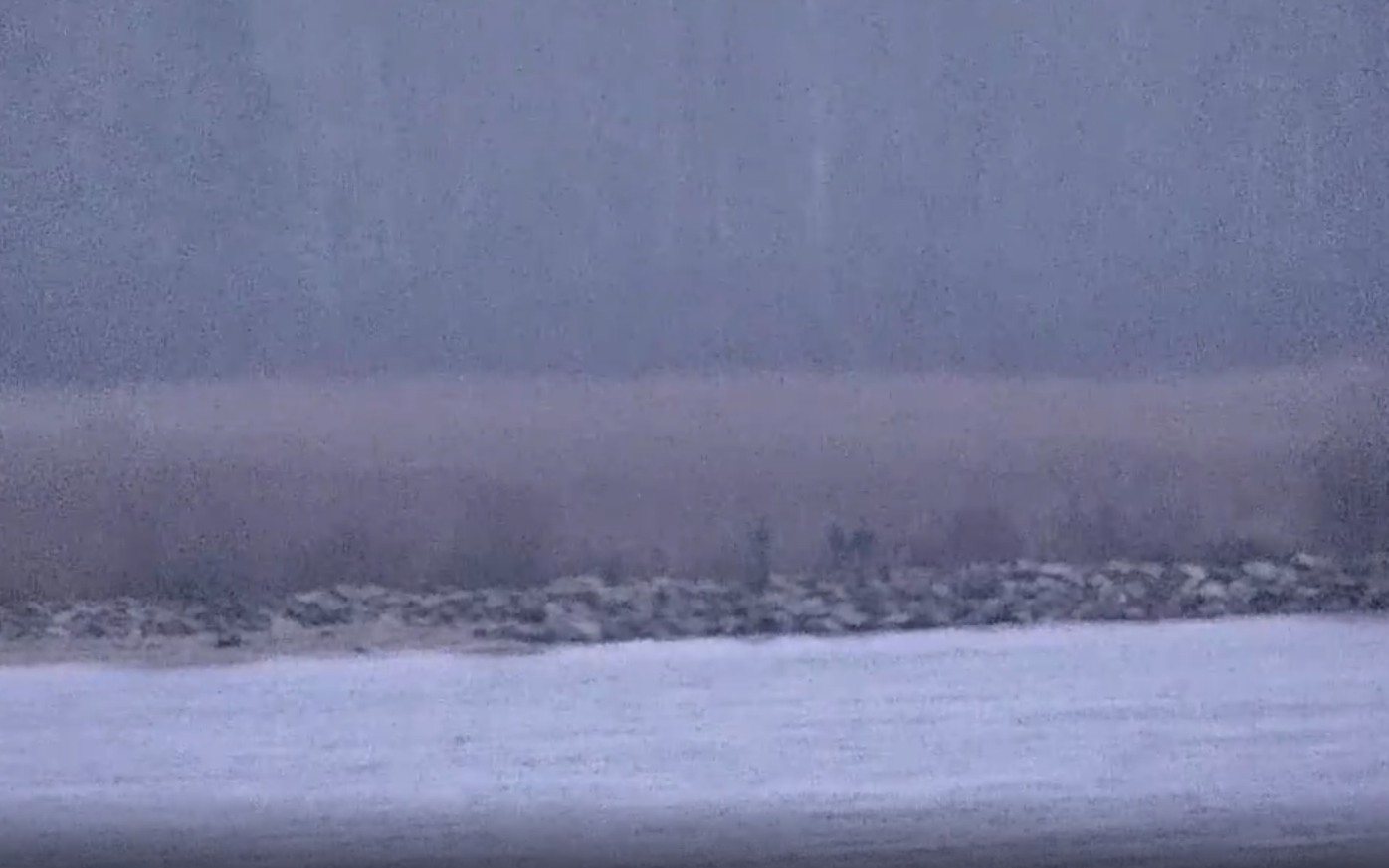 Три российских пограничника на Васкнарвском моле.